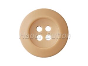Solid color polyester buttons