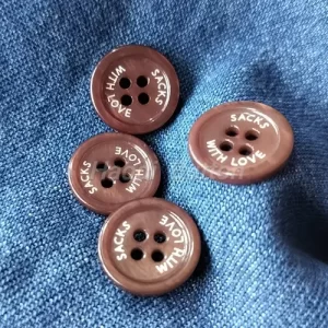 Laser engraved shell buttons