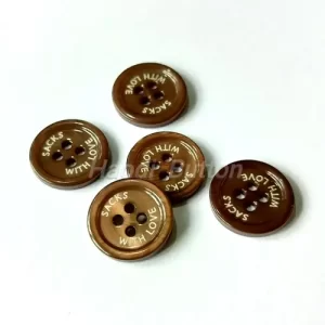 Laser engraved shell buttons